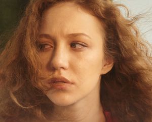 Woman with a watery eye.