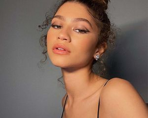 Zendaya with her hair in a bun