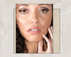 Portrait of BIPOC Woman Wearing Dramatic, Graphic Eyeliner 