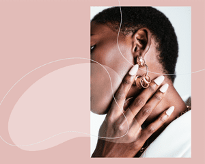 woman touching her neck