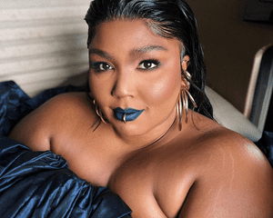 Lizzo wearing black lipstick at the VMAs