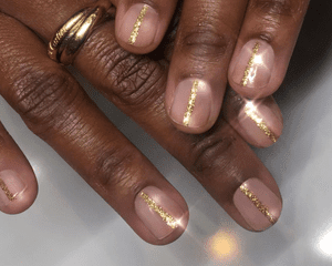 gold striped glitter manicure