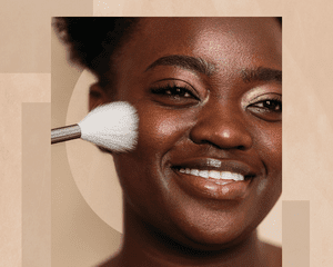 Portrait of a BIPOC Woman Applying Bronzer